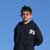 Matt on the top of a sand dune