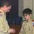 Matthew getting his First Class Rank from his Scoutmaster - February 2006