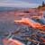The Lake Huron shore lit by the setting sun